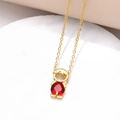 Charming gold boy pendant necklace featuring a vibrant red faceted gemstone heart - Boy Style / 18K Gold / Red