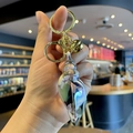 Charming iridescent acrylic conch shell keychain with gold lobster clasp and bell accessory - Large Black Iridescent (pl-1171)