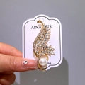 Elegant gold leaf brooch with clear rhinestones and a large white pearl accent - White Crystal Leaf