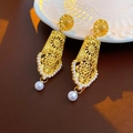 Vintage gold hollow earrings with white pearl pendants shown in an elegant top-down view - 70 Silver Pin-Matte Gold Hollow Flower