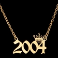 Golden 2004 year pendant necklace with crown detail and delicate chain on black background - 2004 / Gold