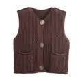 Detail of dark brown crochet knit vest showing retro metal buttons and textured pockets - Coffee