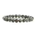 Macro shot of 8mm natural kiwi jasper stone beads with black spots on elastic bracelet - Kiwi Jasper