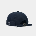 Detail of navy canvas docker hat featuring white M embroidery and metal back strap - Adjustable / Dark Gray