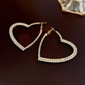 Exaggerated golden heart hoop earrings encrusted with two rows of white rhinestones - Heart Earrings / Gold