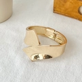 Minimalist gold wide hinged cuff bracelet with sculptural irregular cross-layered design - Streamlined Cross Pleated Hinged Bangle (SL275) / Gold