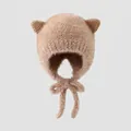 Close-up of plush kids' earflap hat with brown knit bear ears and soft beige faux fur texture - 3-6 Years / Khaki