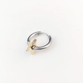 Close-up of minimalist silver hoop earrings featuring a 3D golden star pendant detail - Gold Star Dangle Hoop