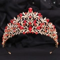 Elegant gold bridal crown with red crystals and leaf design on black velvet background - KC Gold White & Red Rhinestone