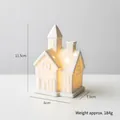 White ceramic mini house night light with star cutouts for Christmas tabletop decor - Castle Style