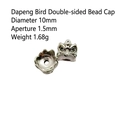Macro detail of 10mm silver bird spacer bead with 1.5mm hole for DIY jewelry making - Garuda Style