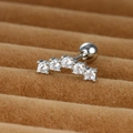 Detailed view of 5-stone curved zircon cartilage stud with round screw ball back - 0.8mm / Silver