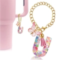 Detail of Letter U resin keychain charm with pink butterfly and tassel on cup - Letter U