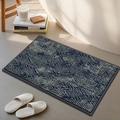 Thick blue-grey chenille bathroom mat with absorbent looped texture in home setting - Diagonal Melody