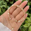 Bracciale placcato oro 18 carati con cristalli a forma di cuore e zirconi cubici rotondi - Bianco Trasparente