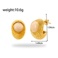 Textured gold-plated C-shaped stainless steel earrings with cat-eye stone - Gold