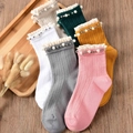 Knit mid-calf socks with lace trim and pearls in pink, grey, white, and earthy tones - One Size / Light Colors Mixed