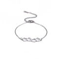 Bracciale in acciaio inossidabile argento con quattro cuori cavi e catena regolabile - Color Acciaio