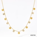 Gold chain necklace featuring colorful zircon and seashell pendants in a delicate layout - Gold + White Zirconia