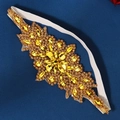 Elegant white elastic headband with golden leaf-shaped rhinestones and champagne crystals - Gold