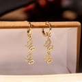 Elegant gold-plated triple butterfly drop earrings with cubic zirconia on jewelry box - Gold Butterfly Style (44730)