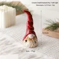 Ceramic Christmas gnome with red hat and star cutout glowing from within - No.7 (Hollow Star Gnome with LED)