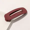 Detailed close-up of matte dark red hollow rectangular hair clip on a white ceramic plate - Matte Hair Clip Large - Wine Red