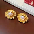 Golden shell-shaped earrings featuring central pearls with a brushed metal texture finish - Silver Earring Post Pearl Shell Earrings