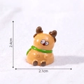 Miniature Christmas deer figurine with green scarf and yellow body, size 2.4cm x 2.1cm - Tilted Head Elk