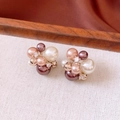 Detail view of cluster pearl earrings with 18K gold plating and sparkling zircons - Multi-Color Pearl Cluster Gold Earrings