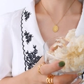 Golden oval tulip engraved flower pendant necklace worn with minimalist rings - February Flower(P1143) / 40cm+5cm / Gold