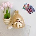 Cute beige hand-woven crossbody bag for kids featuring a white plush bear and red ribbon - Bear