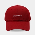 Minimalist red cotton baseball cap featuring white betweenaod embroidery on a gray background - Adjustable / Burgundy