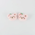 Detail view of two plush pink bear pins featuring strawberry embroidery and soft texture - Accessory Patch (No Pin) / Small Pink Bear with Strawberry