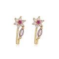 Macro detail of gold flower stud earrings with pink and white zircon stone petals - Gold Rose Flower Purple Leaf
