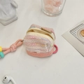 Macro detail of a pink tweed storage pouch with double zippers and decorative lanyard - Pink