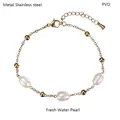 Detail of PVD vacuum plated stainless steel gold chain featuring natural freshwater pearls - Gold - Fresh Water Pearl