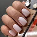 Glossy milky white long square press-on nails shown as a professional manicure finish - Medium Square / Light Pink