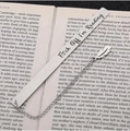Silver stainless steel bookmark with feather charm featuring funny engraved quote on an open book - Fuck Off I'm Reading (Feather Pendant)