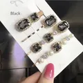 Elegante set da 4 pezzi di fermagli vintage con strass neri e perle da donna - Set da 4 Grigio