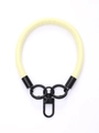 Detail of light yellow leather phone wrist strap with black metal swivel hook and rings - Light Yellow