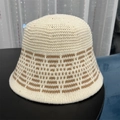 Knitted bucket hat in beige with brown geometric jacquard pattern on a black surface - One Size / Beige Khaki Grid Semi-Rhombus Knit