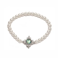 Elegante pulsera de perlas con incrustación de concha bañada en oro y circonitas en blanco - Flor Plateada