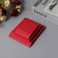 Three assorted sizes of premium red paper jewelry envelopes stacked on a grey desk - Red Cardboard Sleeve / Round Base