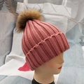 Pink ribbed knit beanie with fluffy brown faux fur pom pom for winter warmth - Dusty Pink