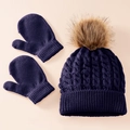 Detailed knit texture of dark purple winter hat with faux fur pom and matching mittens - Navy Blue 2-Piece Set