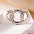 Minimalist silver multilayer leaf ring in titanium steel with woven hollow texture - Steel Color 62