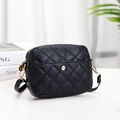 Classic black quilted crossbody bag in pebble leather with golden metal magnetic buckle - Black