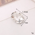 Detail showing 1.4x1cm clear glass crystal rhinestone with specific size dimensions - 10*14 Oval Claw Rhinestone