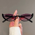 Retro cat-eye sunglasses featuring a black frame and translucent purple lenses - Black Frame Gradient Purple Lens